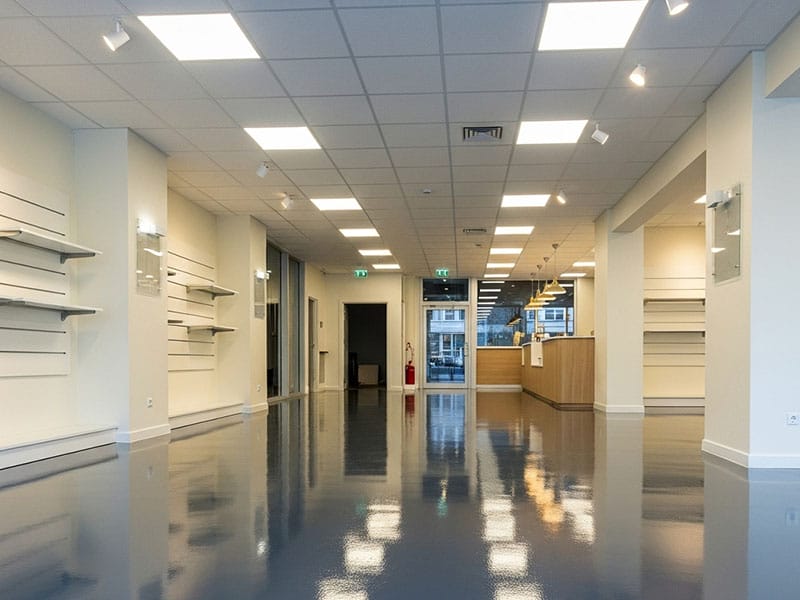 Spacious office with a new, grey epoxy floor