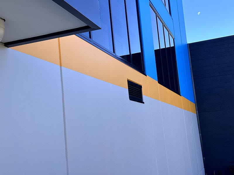After shot of the same building, looking fresh and modern
